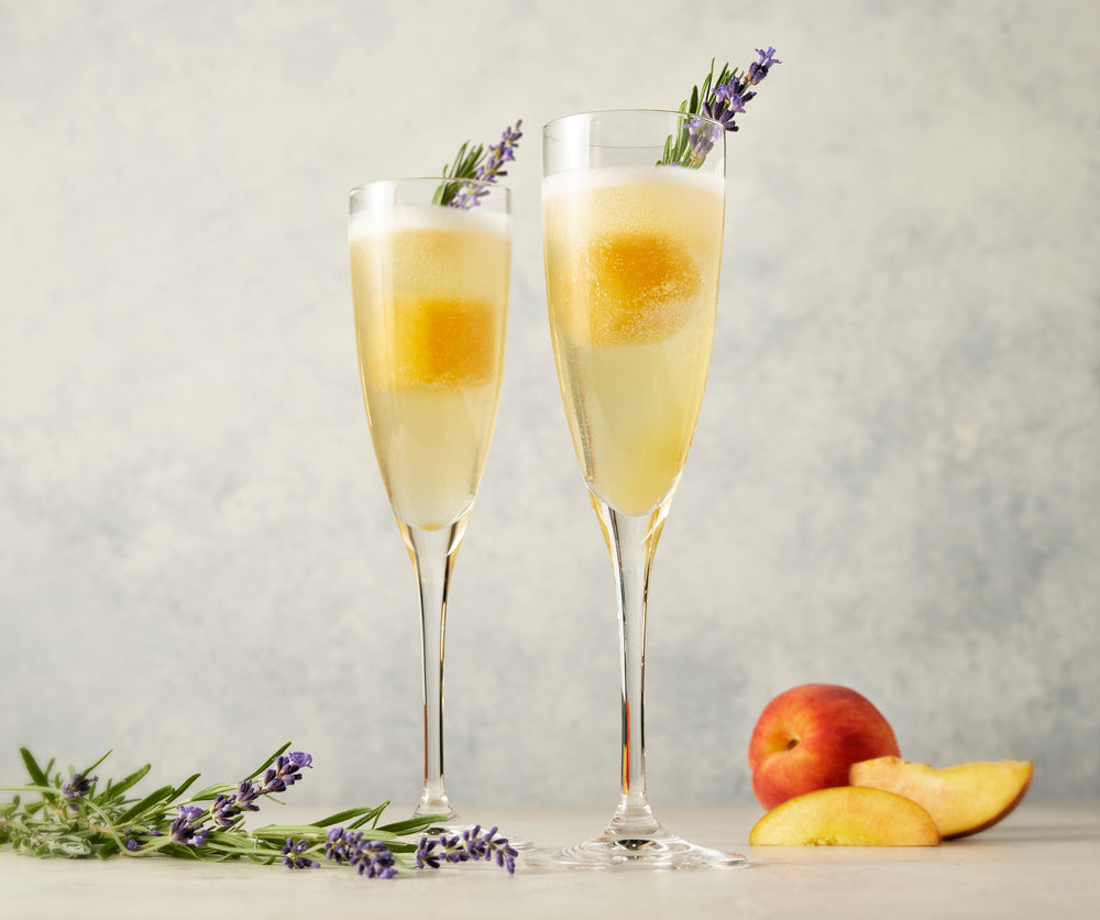 Lavender Peach Mixicles in Champagne flutes